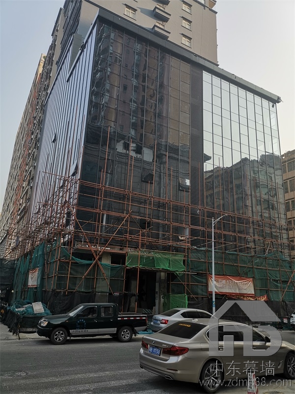 為什么現(xiàn)代建筑用玻璃幕墻？